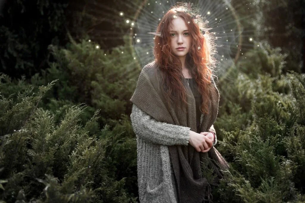 Half elf druid names - An elf in the woods with light shining around her head