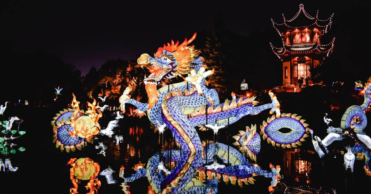 Blue dragon names - A Chinese blue dragon in water at night